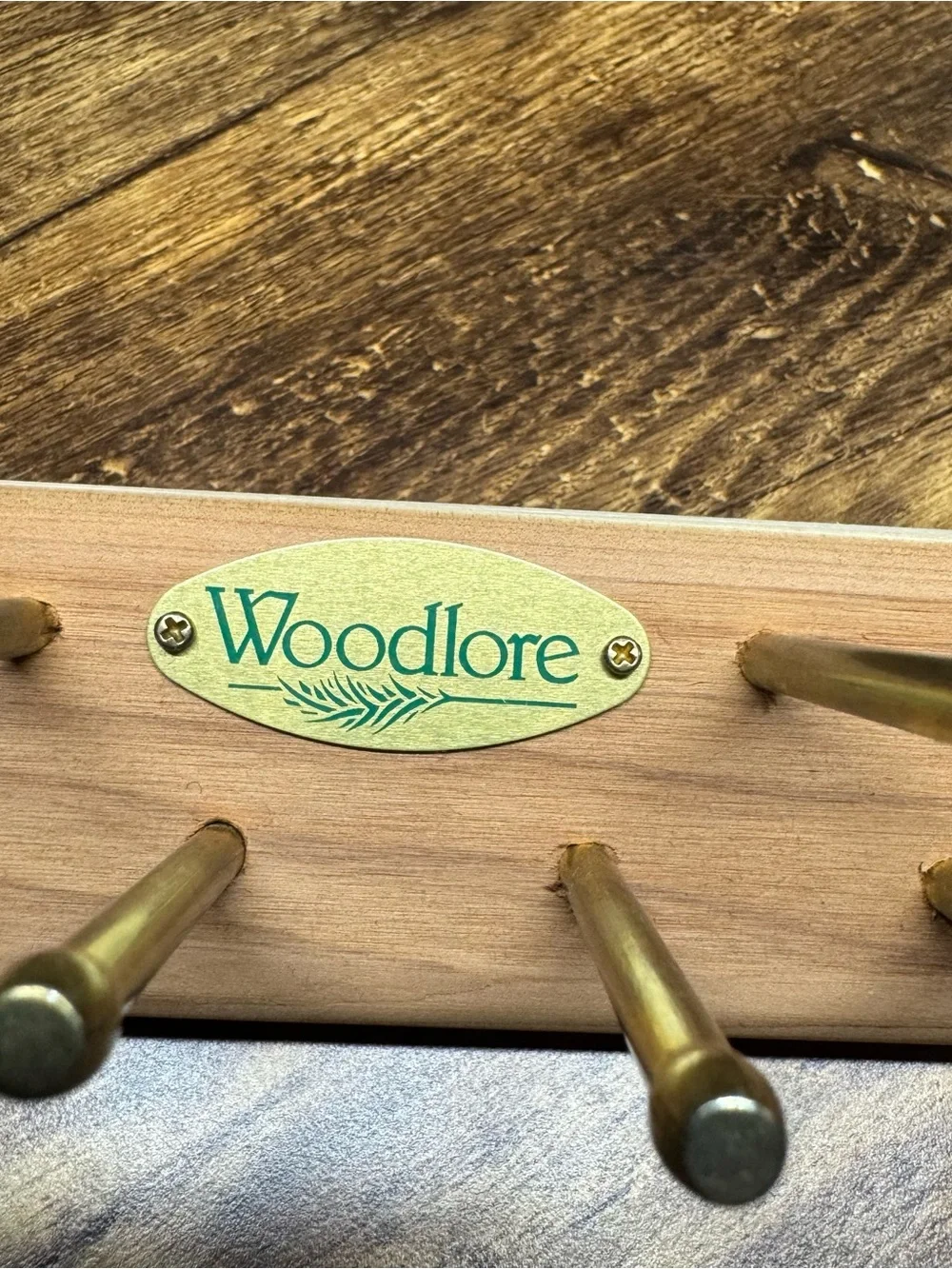Brass Peg Wall Rack in Natural Wood